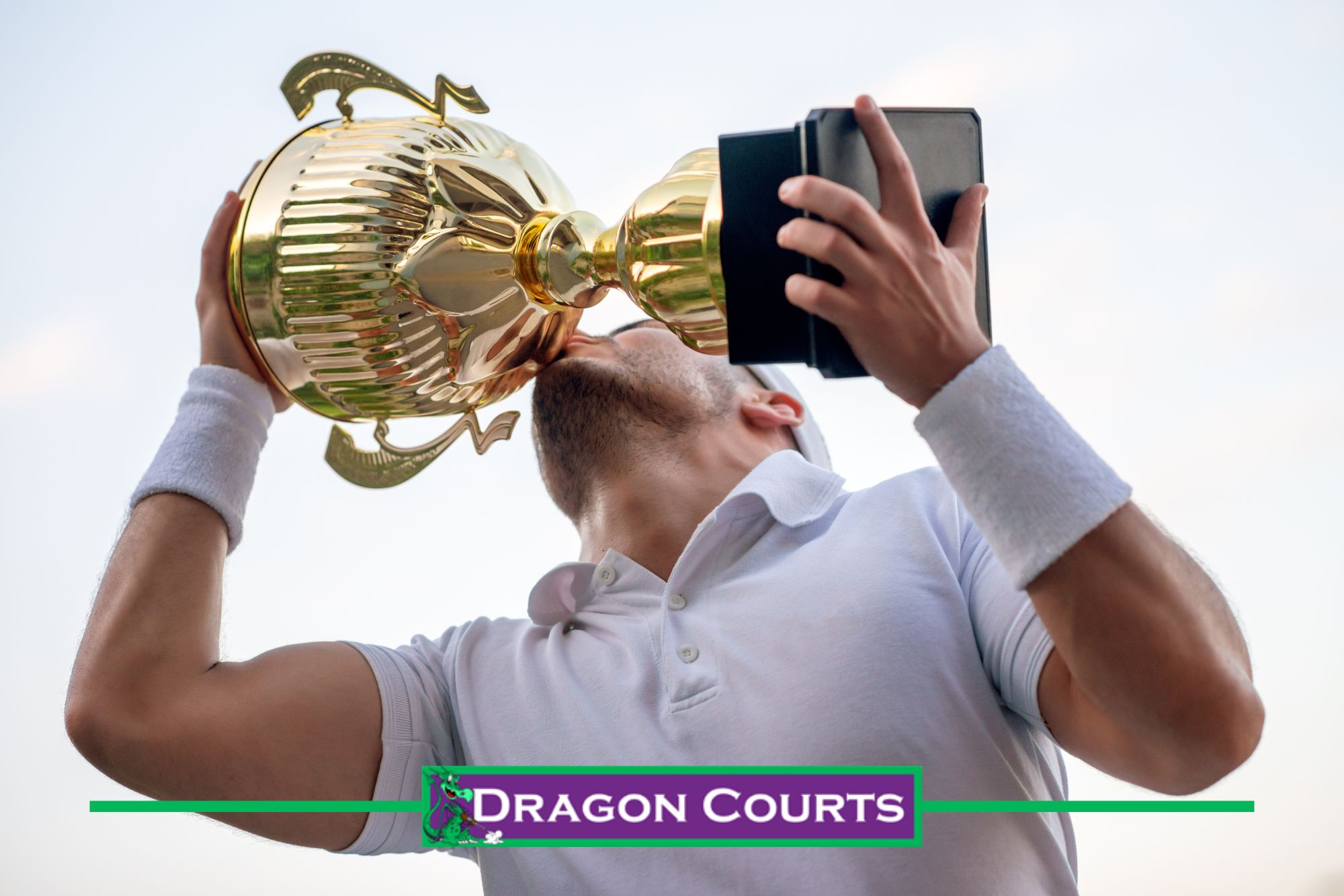 Tennis champion kissing trophy